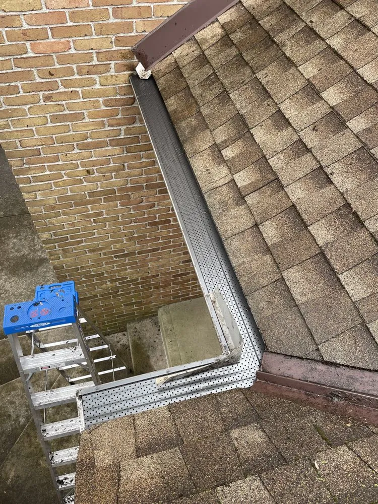 Slide of Hughes Seamless Gutters