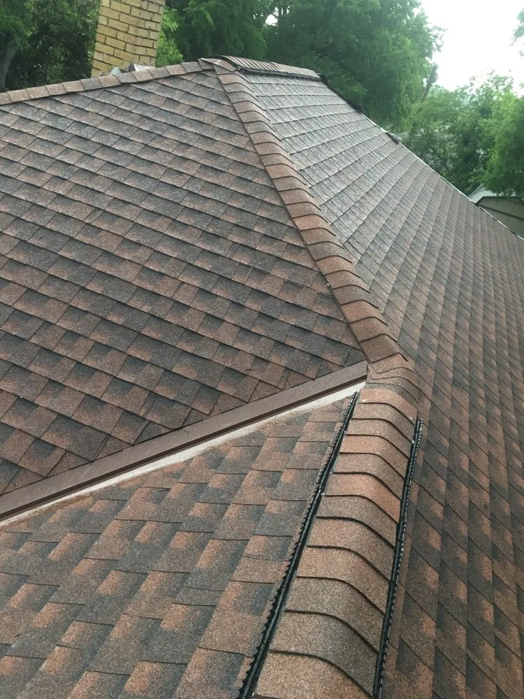 Slide of Humberto's Roofing Service