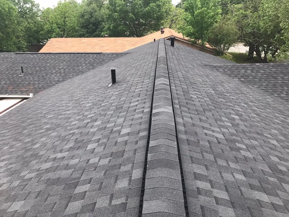 Slide of Humberto's Roofing Service