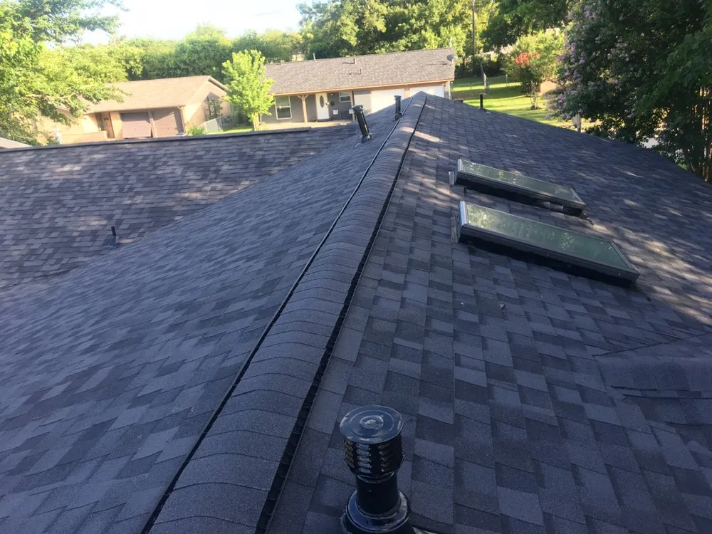 Slide of Humberto's Roofing Service