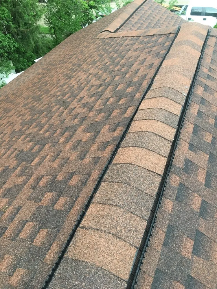 Slide of Humberto's Roofing Service