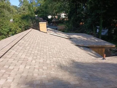 Slide of Humble Roofing