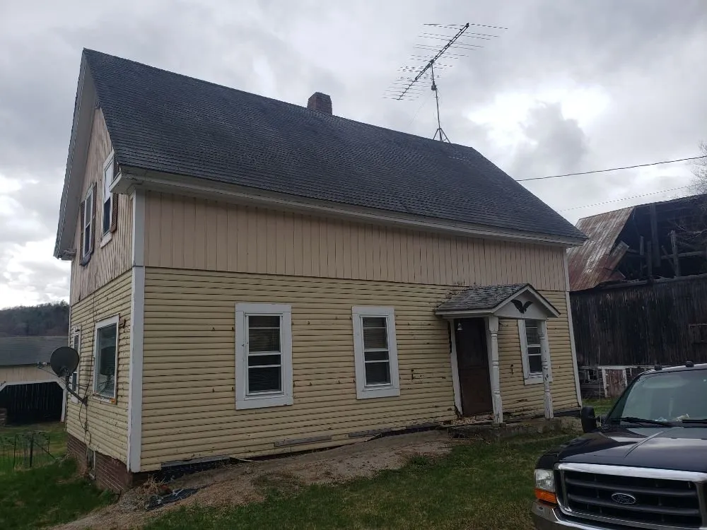 Slide of Humphrey's roofing and construction