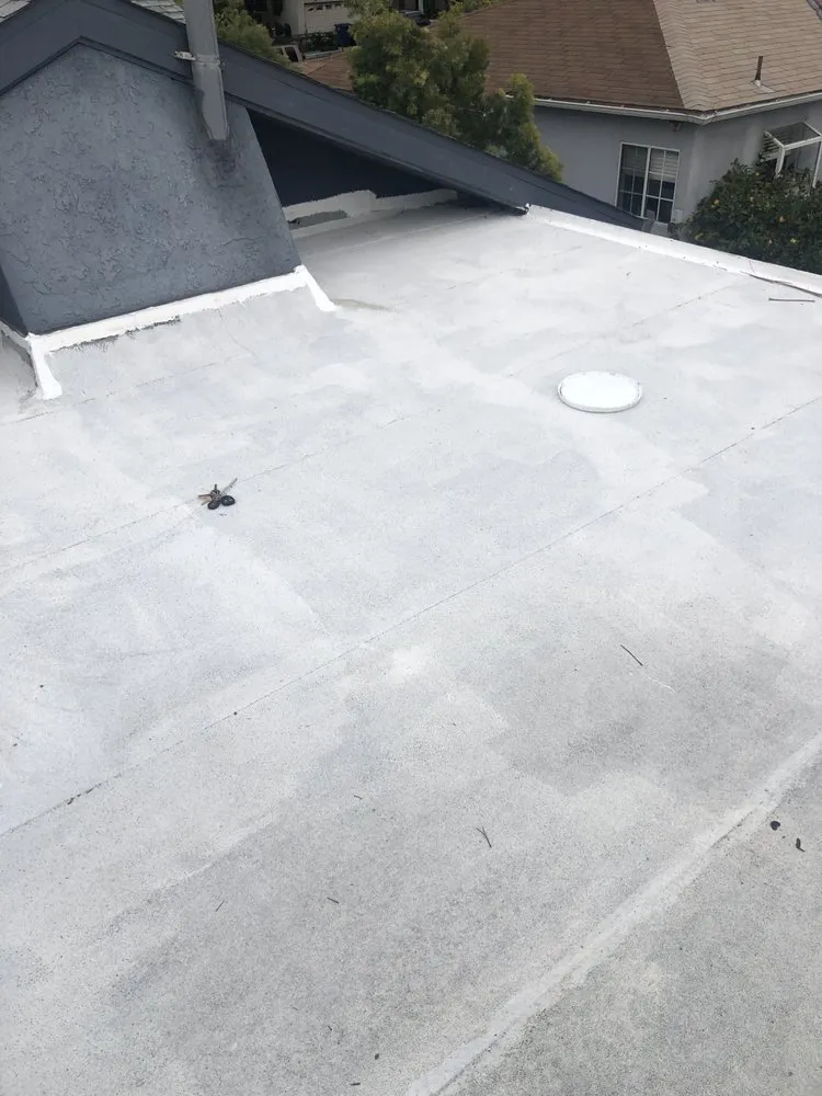 Slide of Huncho Roofer