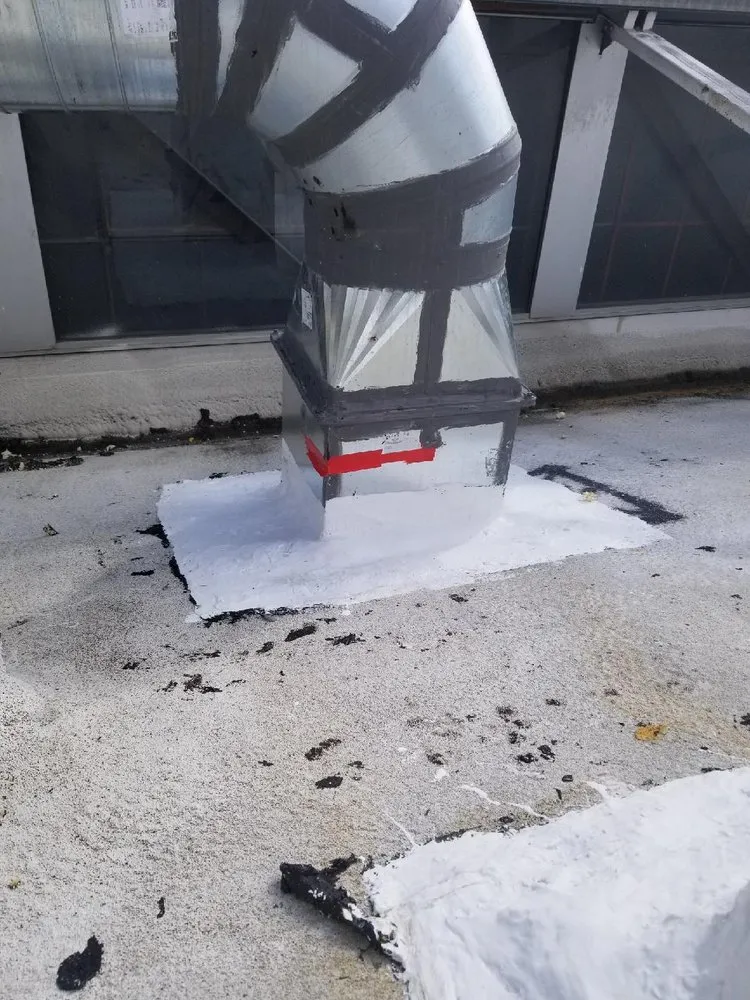 Slide of Huncho Roofer