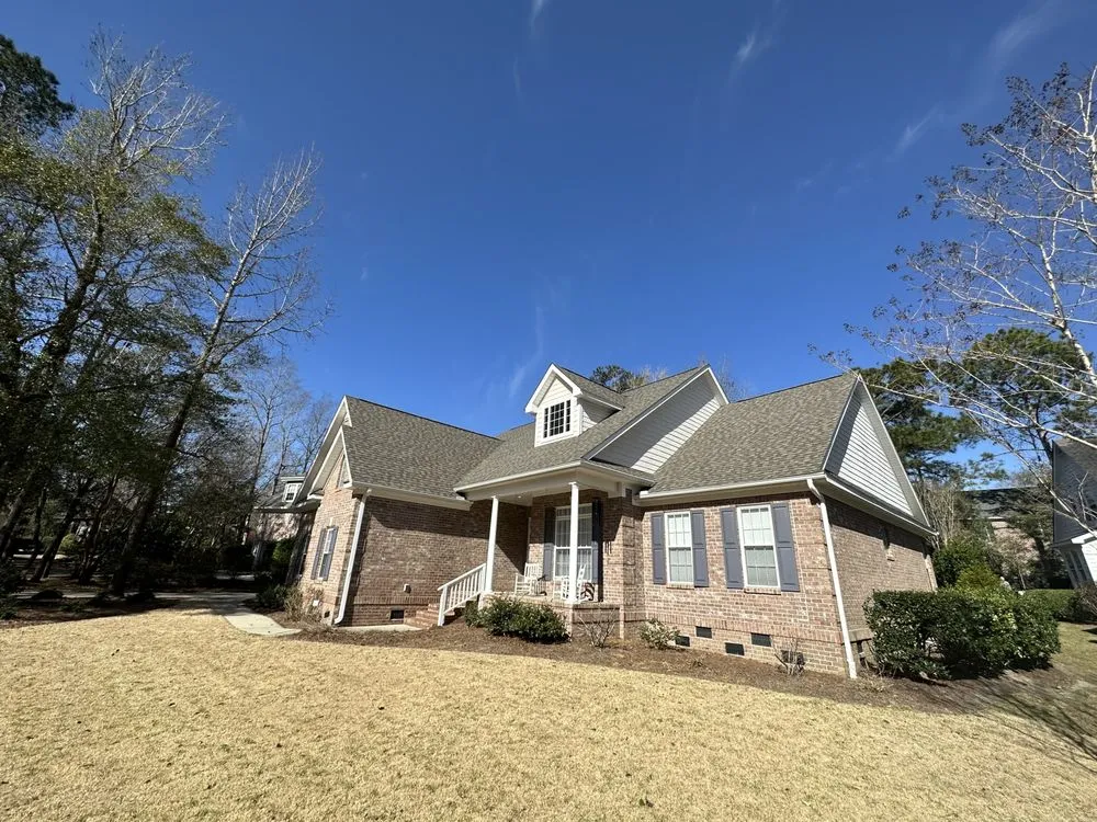 Slide of Hunt Riggs Roofing