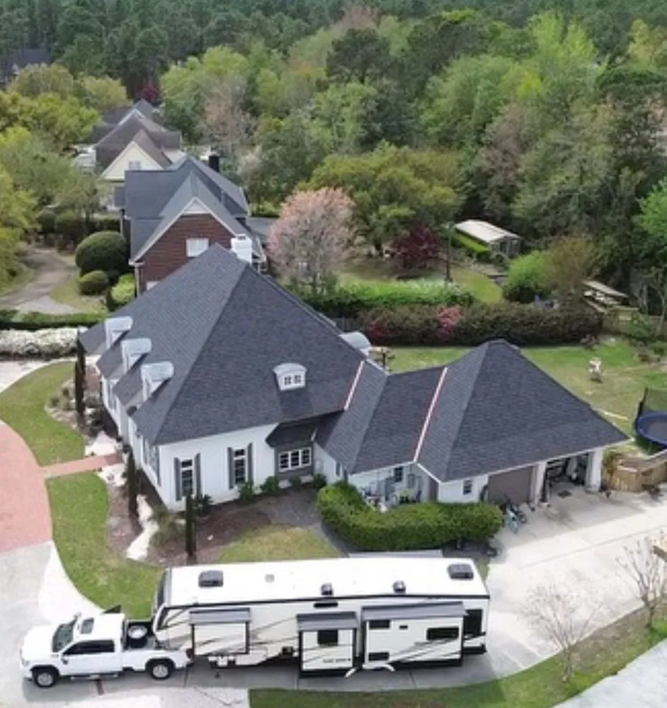 Slide of Hunt Riggs Roofing