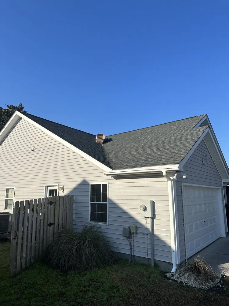 Slide of Hunt Riggs Roofing