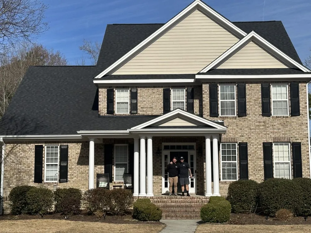 Slide of Hunt Riggs Roofing