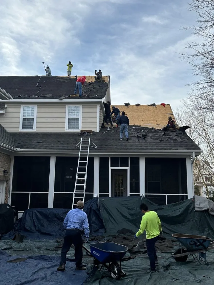 Slide of Hunt Riggs Roofing