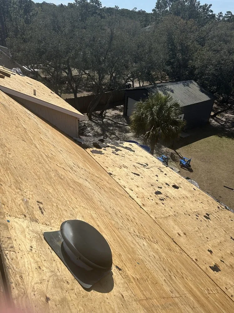 Slide of Hunt Riggs Roofing