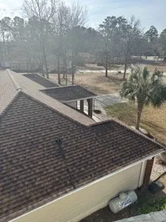 Slide of Hunt Riggs Roofing