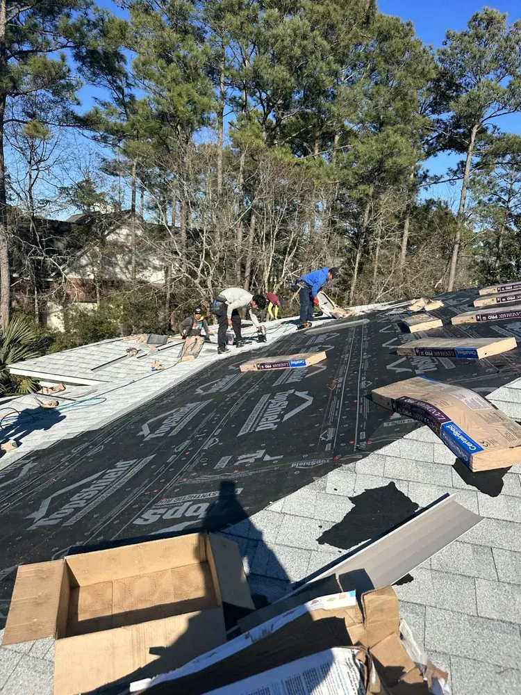 Slide of Hunt Riggs Roofing