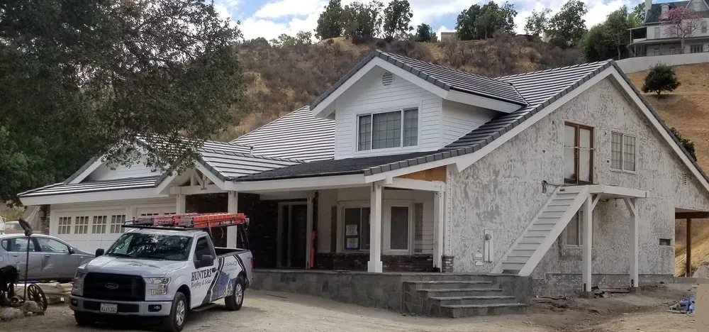 Slide of Hunters Roofing