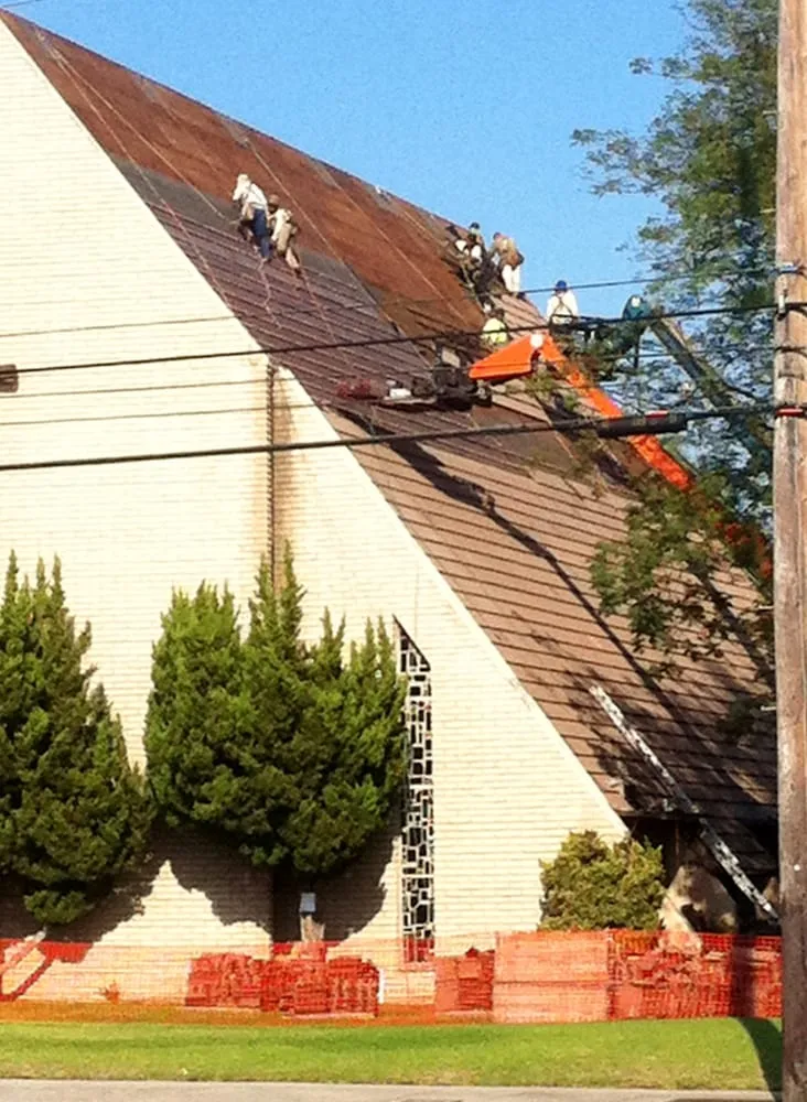 Slide of Hunters Roofing