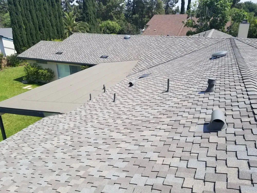 Slide of Hunters Roofing