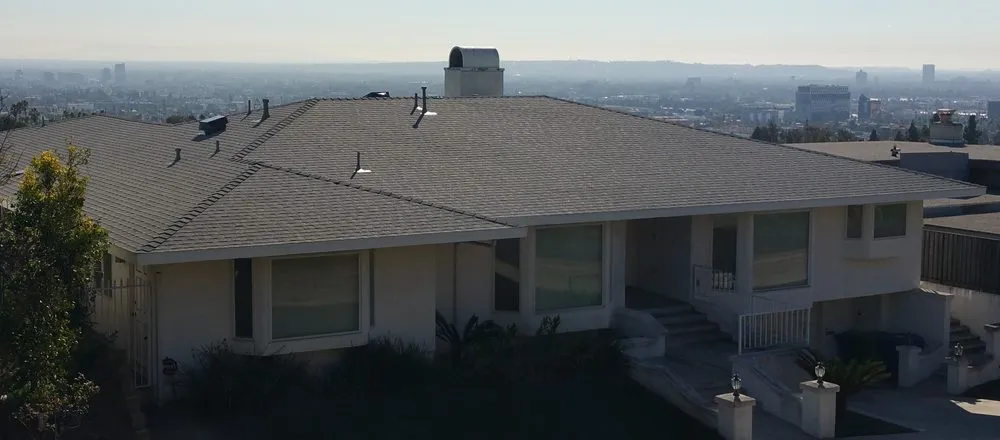 Slide of Hunters Roofing