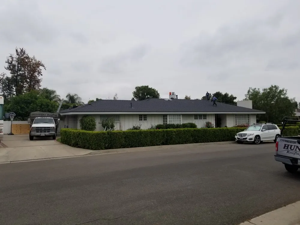 Slide of Hunters Roofing