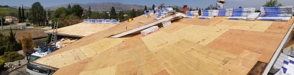 Slide of Hunters Roofing