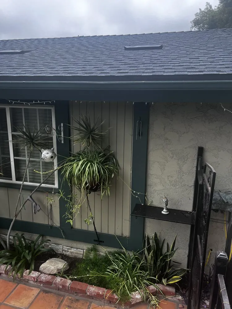 Slide of Hunters Roofing