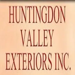 Licensed storm damage roof repair in Huntingdon Valley, PA by Huntingdon Valley Exteriors