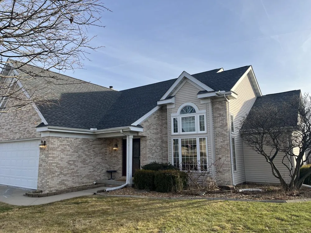 Slide of Hunt's Roofing