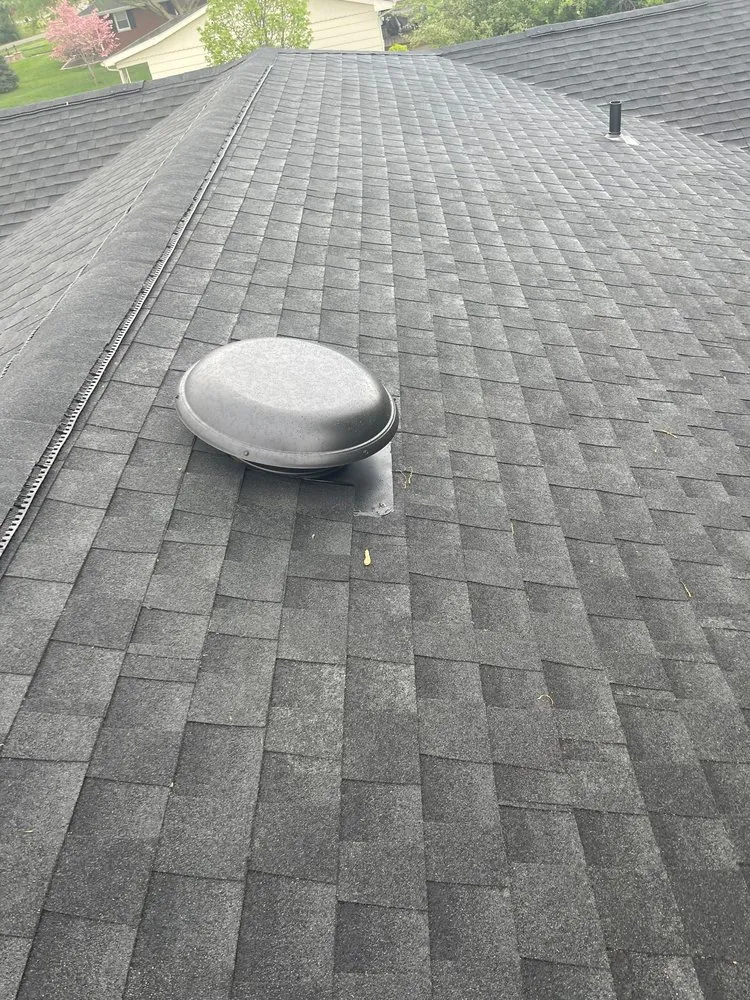 Slide of Hunt's Roofing