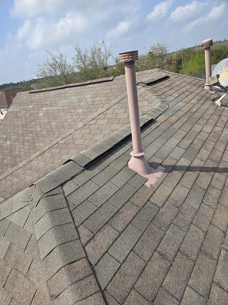 Slide of Hurtado's Roofing