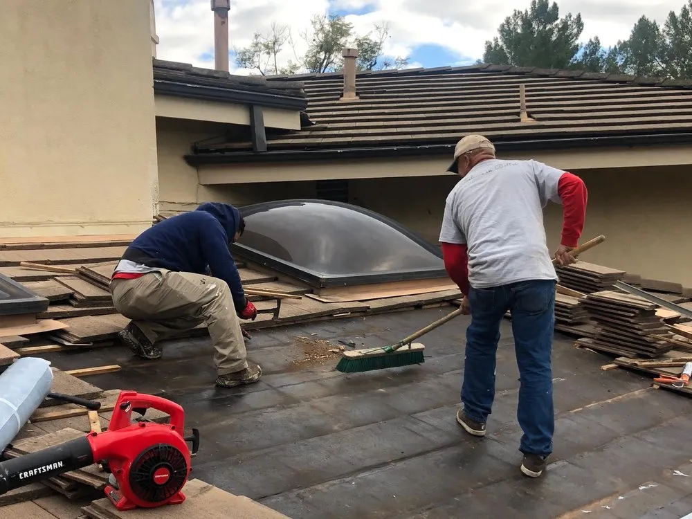 Slide of HUS Roofing