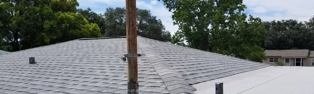 Slide of Husar Roofing