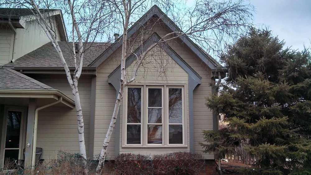 Slide of Husker Roofing Siding & Gutter