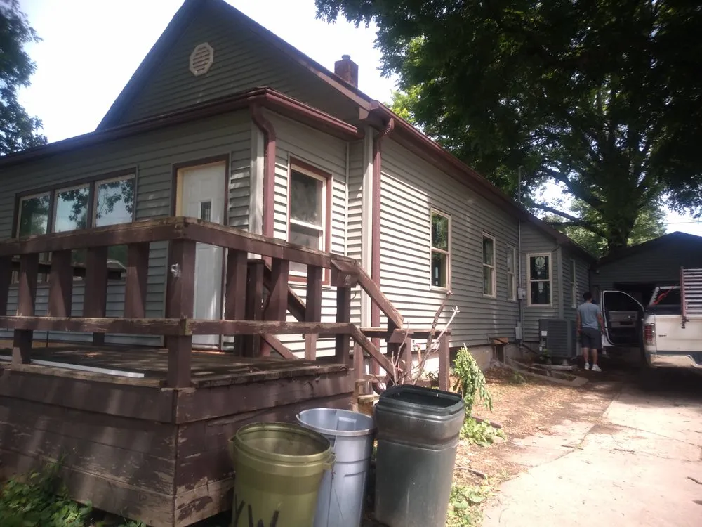 Slide of Husker Roofing Siding & Gutter