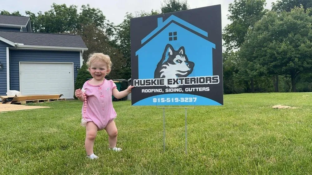 Slide of Huskie Exteriors