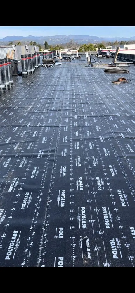 Slide of Husky Roofing