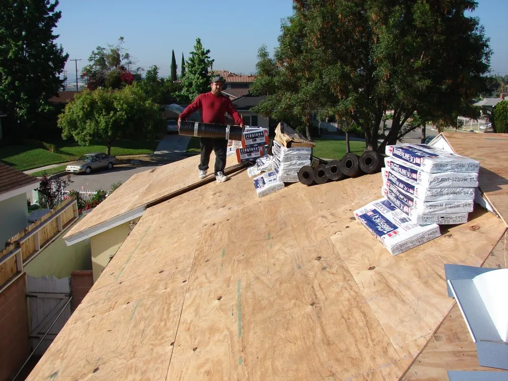 Slide of Husky Roofing