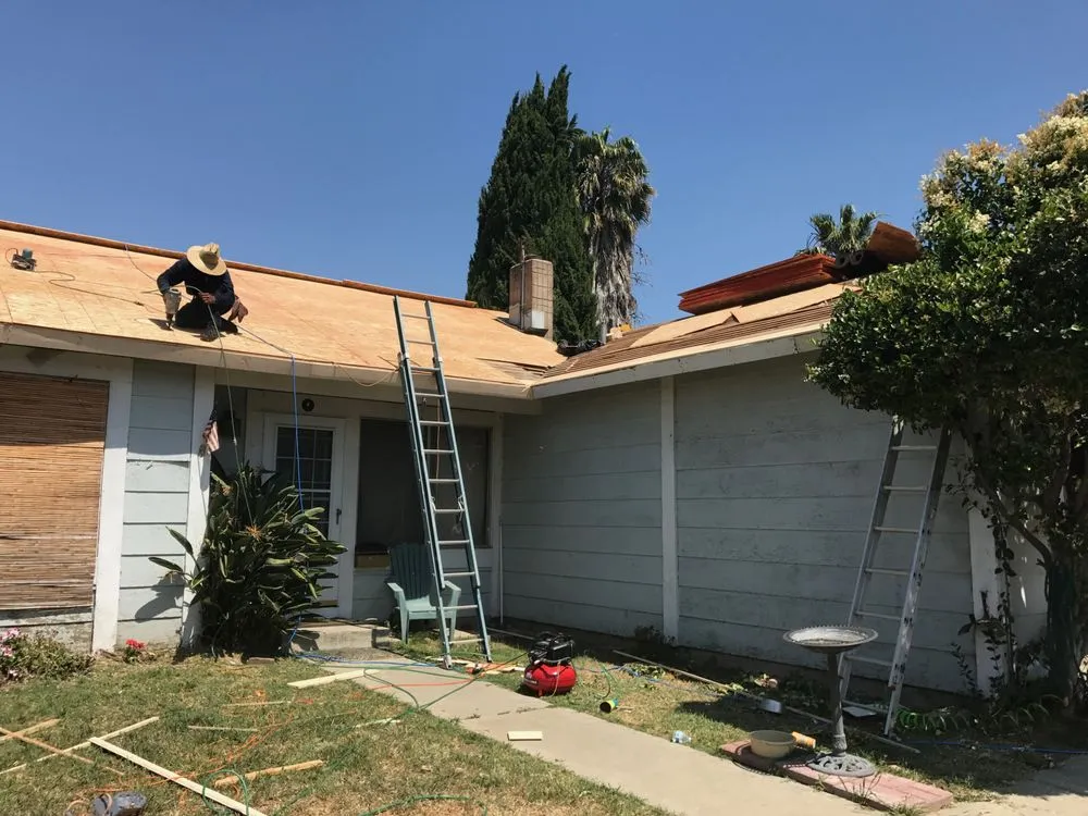 Slide of Husky Roofing