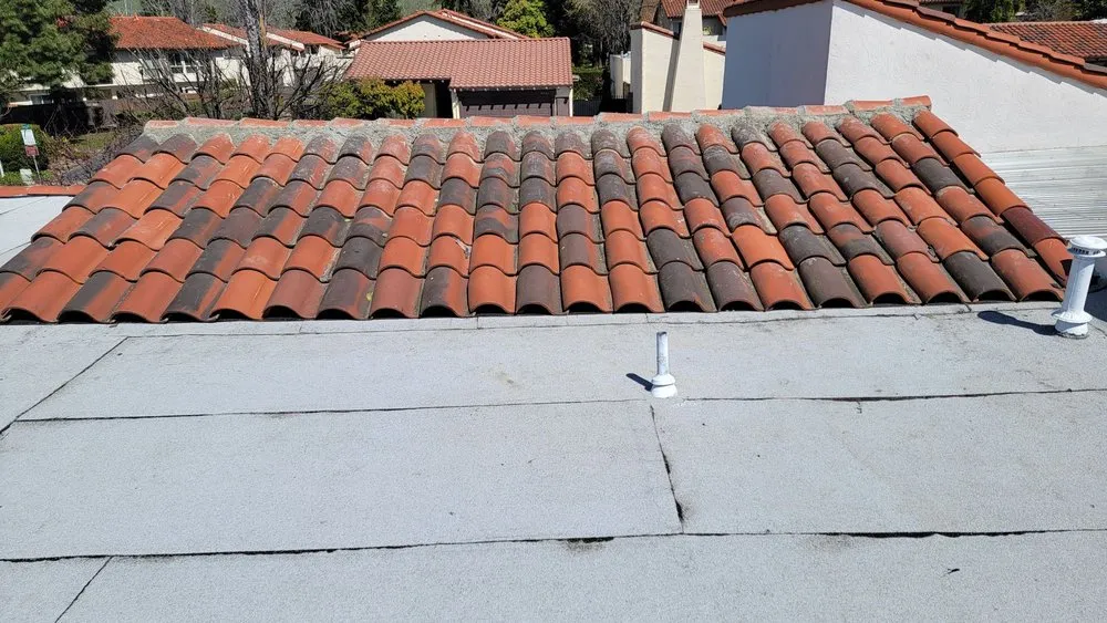 Slide of Husky Roofing