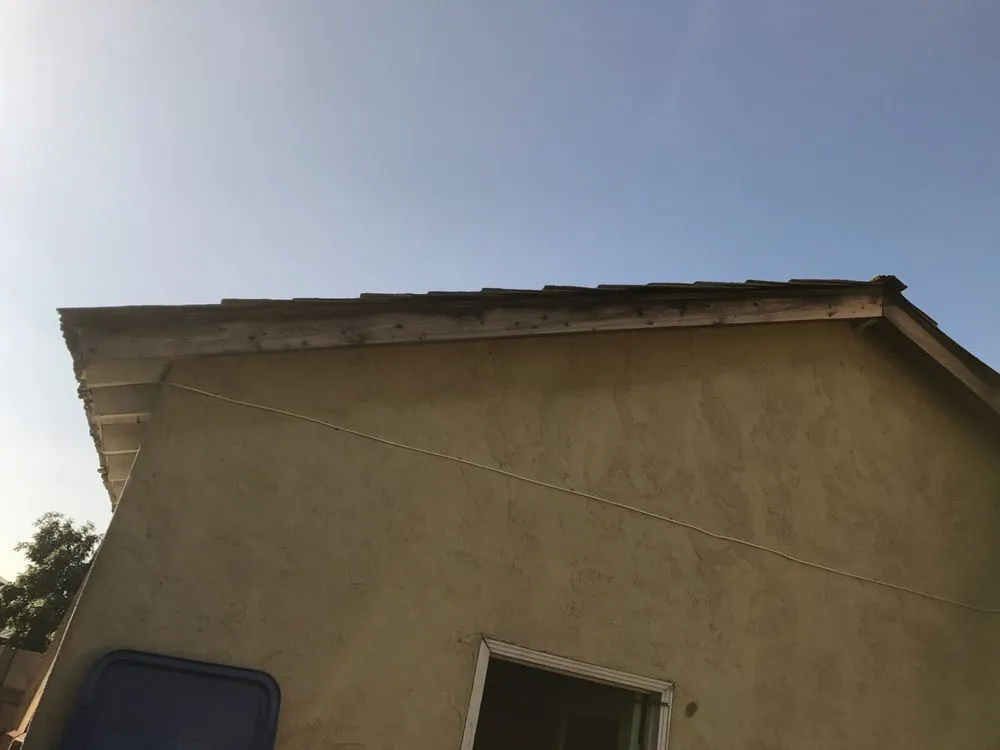 Slide of Husky Roofing