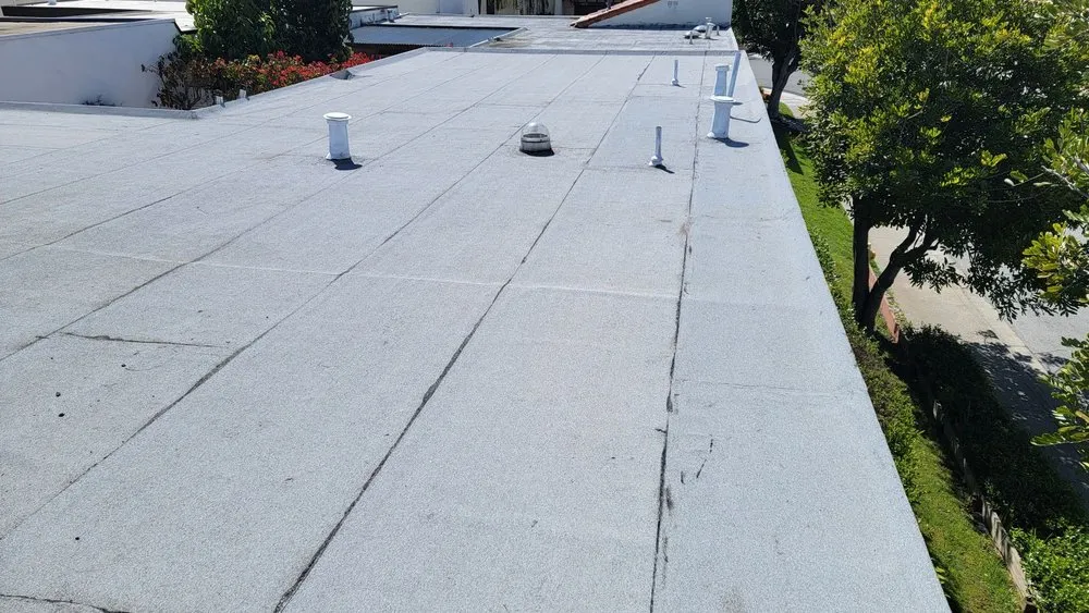 Slide of Husky Roofing