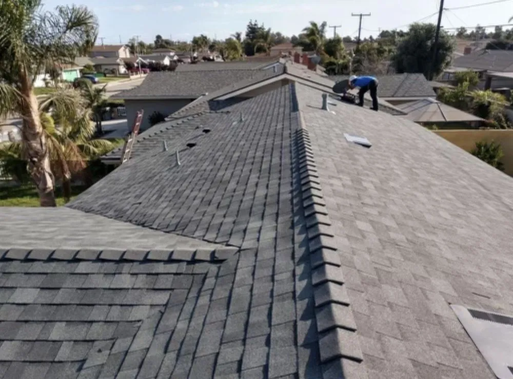 Slide of Husky Roofing