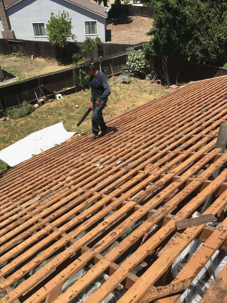 Slide of Husky Roofing