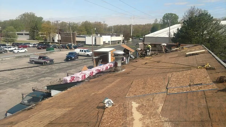 Slide of Husky Roofing