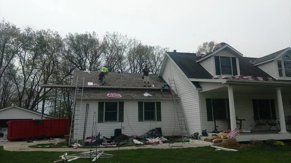 Slide of Husky Roofing