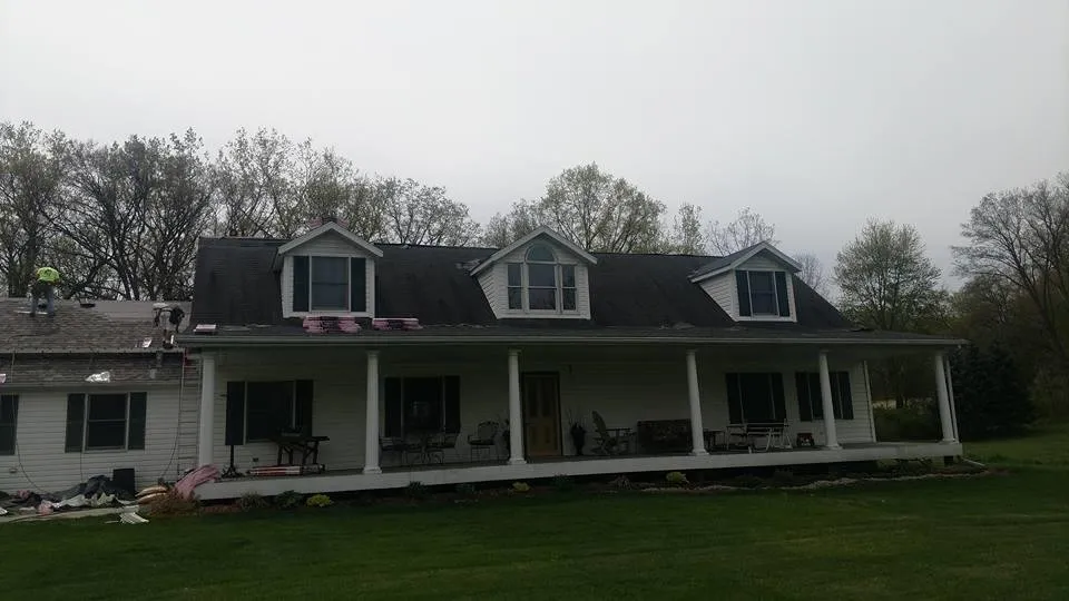 Slide of Husky Roofing