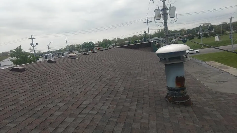 Slide of Husky Roofing