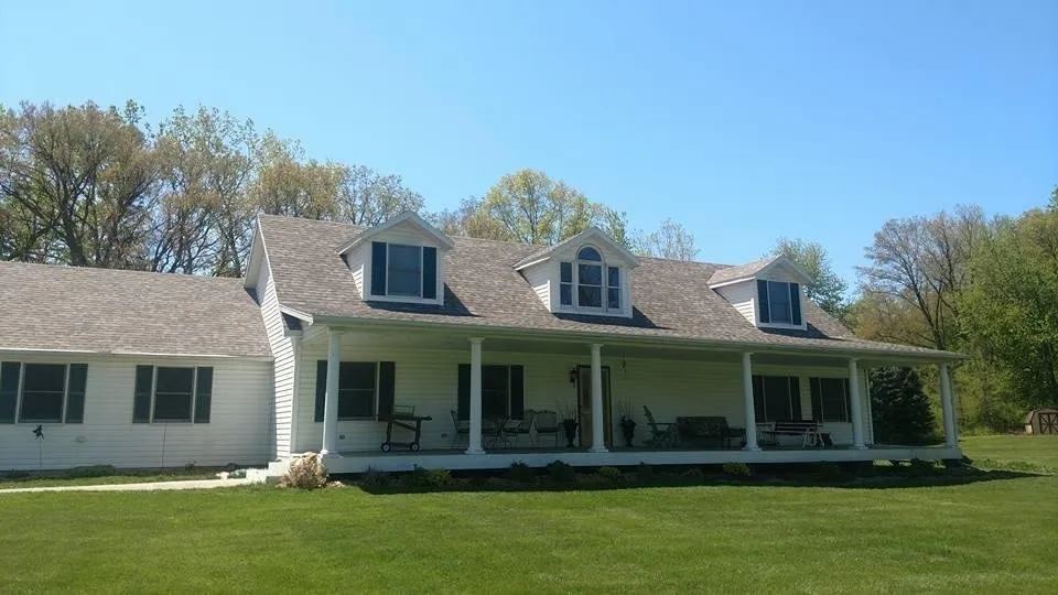 Slide of Husky Roofing