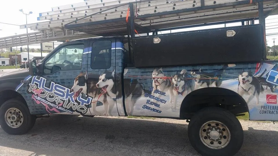 Slide of Husky Roofing