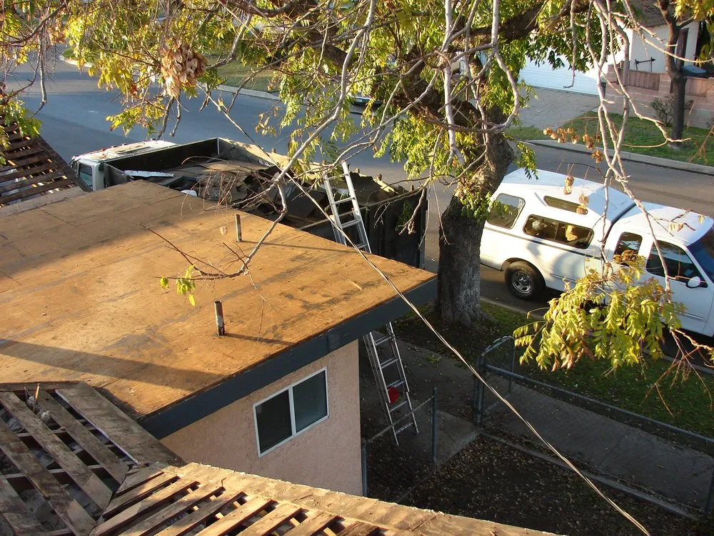 Slide of Husky Skyline Roofing
