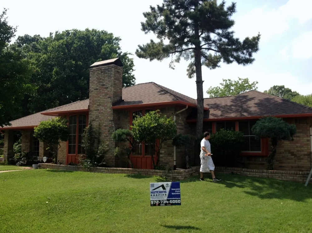 Slide of Hutchins Roofing & Construction, LLC