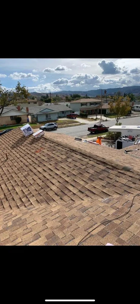 Slide of I Can Roofing